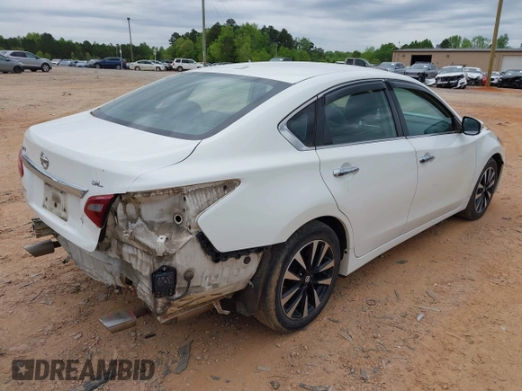 2018 Nissan Altima S with VIN 1N4AL3AP9JC128686, listed as a IAAI auction lot 42038517 with 159,024 mi miles and . Bid and sale history available at DreamBid. Image 4.