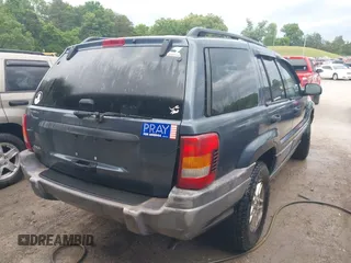 2004 Jeep Grand Cherokee Laredo z VIN 1J4GW48S64C152101, wystawiony jako IAAI lot #42165988 z przebiegiem 244 247 mil mil oraz . Historia ofert i sprzedaży dostępna na DreamBid. Obrazek 4.