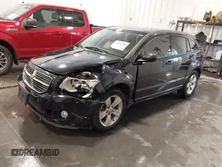 2011 Dodge Caliber Mainstreet with VIN 1B3CB3HA2BD148279, listed as a IAAI auction lot 42150488 with 131,278 mi miles and . Bid and sale history available at DreamBid. Image 18.