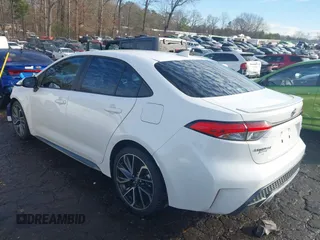 2021 Toyota Corolla SE with VIN 5YFS4MCE3MP059499, listed as a IAAI auction lot 41311027 with 69,268 mi miles. Bid and sale history available at carsss.com. Image 3.