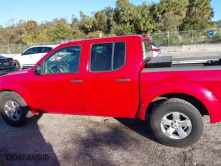 2009 Nissan Frontier SE with VIN 1N6AD07U19C419811, listed as a IAAI auction lot 41090904 with 141,119 mi miles. Bid and sale history available at carsss.com. Image 14.