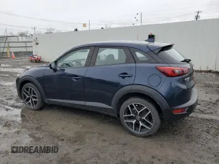 2017 Mazda CX-3 Touring with VIN JM1DKFC71H0164263, listed as a Copart auction lot 48951125 with 96,989 mi miles and Clean Title. Bid and sale history available at DreamBid. Image 2.