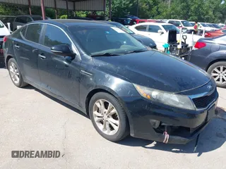 2013 Kia Optima EX z VIN 5XXGN4A74DG163743, wystawiony jako IAAI lot #42365064 z przebiegiem 217 998 mil mil oraz . Historia ofert i sprzedaży dostępna na DreamBid. Obrazek 1.