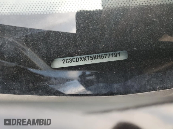2019 Dodge Charger Police with VIN 2C3CDXKT5KH577191, listed as a Copart auction lot 56551635 with 51,024 mi miles and Salvage title. Bid and sale history available at DreamBid. Image 12.