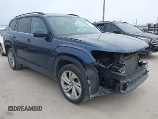 2021 Volkswagen Atlas SE z VIN 1V2WR2CA7MC587011, wystawiony jako IAAI lot #41684742 z przebiegiem 73 970 mil mil oraz . Historia ofert i sprzedaży dostępna na DreamBid. Obrazek 1.