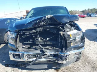 2016 Ford F-150 XLT with VIN 1FTEW1EP6GKE20697, listed as a IAAI auction lot 41768860 with 87,935 mi miles. Bid and sale history available at carsss.com. Image 4.