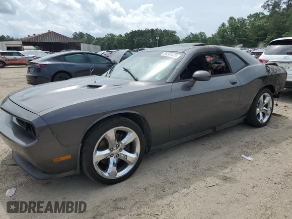 2013 Dodge Challenger R/T Classic z VIN 2C3CDYBT3DH667951, wystawiony jako Copart lot #55301675 z przebiegiem Nie podano mil oraz Szkoda całkowita • Salvage title. Historia ofert i sprzedaży dostępna na DreamBid. Obrazek 1.