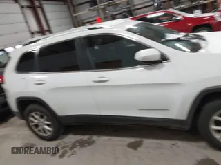 2015 Jeep Cherokee Latitude z VIN 1C4PJMCB4FW635406, wystawiony jako IAAI lot #41168412 z przebiegiem 131 089 mil mil oraz . Historia ofert i sprzedaży dostępna na DreamBid. Obrazek 13.