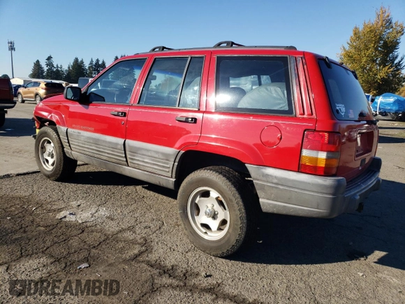 1998 Jeep Grand Cherokee Laredo with VIN 1J4GZ58S3WC245142, listed as a Copart auction lot 79434534 with 276,971 mi miles and Salvage Title. Bid and sale history available at carsss.com. Image 2.