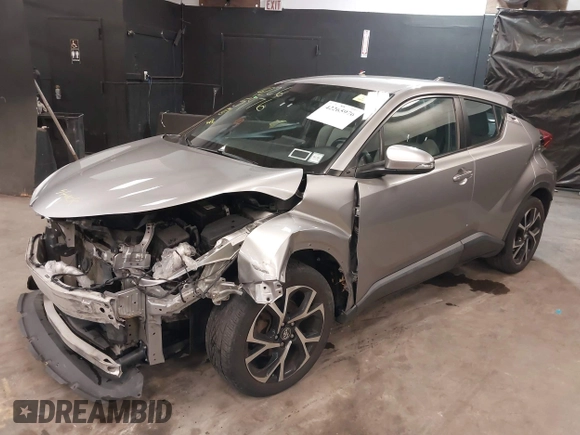 2018 Toyota C-HR XLE z VIN NMTKHMBX5JR039263, wystawiony jako IAAI lot #42265976 z przebiegiem 88 253 mil mil oraz . Historia ofert i sprzedaży dostępna na DreamBid. Obrazek 18.