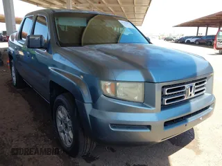 2006 Honda Ridgeline RTL with VIN 2HJYK16586H540881, listed as a IAAI auction lot 42701293 with 155,583 mi miles and . Bid and sale history available at DreamBid. Image 1.