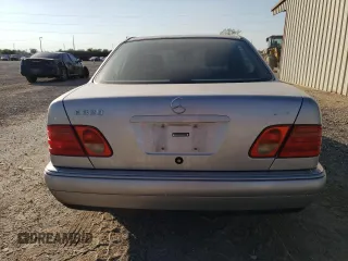 1998 Mercedes-Benz E-Class with VIN WDBJF65F1WA711193, listed as a Copart auction lot 76052034 with 168,935 mi miles and Salvage Title. Bid and sale history available at carsss.com. Image 6.