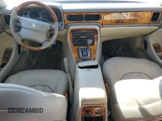 1995 Jaguar XJ with VIN SAJKX1743SC734007, listed as a Copart auction lot 46340825 with 130,115 mi miles and Salvage Title. Bid and sale history available at DreamBid. Image 8.