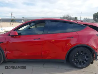 2023 Tesla Model Y Long Range with VIN 7SAYGAEE7PF713761, listed as a IAAI auction lot 41638067 with 46,089 mi miles and . Bid and sale history available at DreamBid. Image 14.