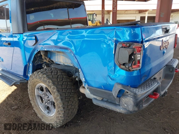2021 Jeep Gladiator Rubicon with VIN 1C6JJTBGXML516164, listed as a IAAI auction lot 41837544 with 48,197 mi miles and . Bid and sale history available at DreamBid. Image 6.