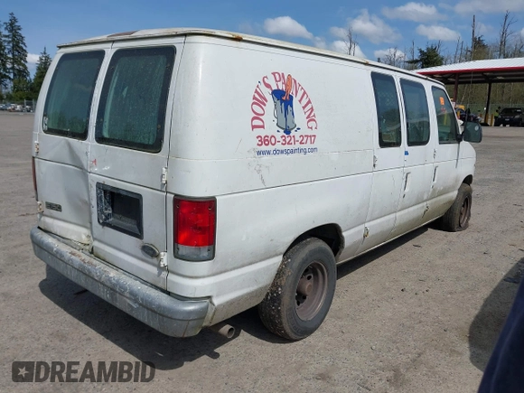 2000 Ford Econoline Cargo with VIN 1FTRE14W7YHA37668, listed as a IAAI auction lot 42001679 with 210,713 mi miles. Bid and sale history available at carsss.com. Image 4.