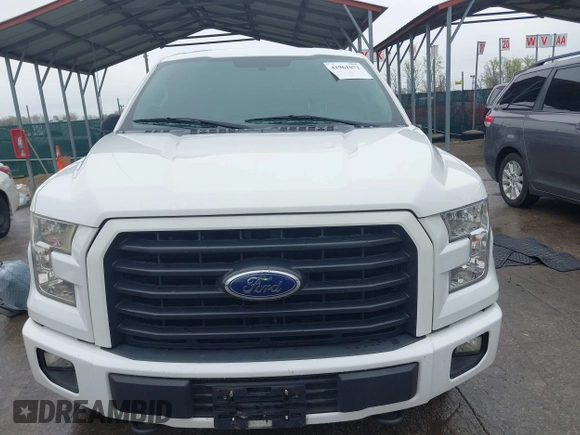 2015 Ford F-150 XLT with VIN 1FTEW1E80FFB30827, listed as a IAAI auction lot 41961072 with 155,206 mi miles and . Bid and sale history available at DreamBid. Image 12.