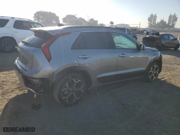 2023 Kia Niro Plug-In Hybrid SX Touring with VIN KNDCR3LF7P5052338, listed as a Copart auction lot 75649254 with 11,919 mi miles and Salvage Title. Bid and sale history available at carsss.com. Image 3.