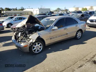 2001 Mercedes-Benz C 320 with VIN WDBRF64JX1F125063, listed as a Copart auction lot 70102164 with 204,937 mi miles and Salvage Title. Bid and sale history available at carsss.com. Image 1.
