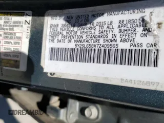 2007 Pontiac Vibe with VIN 5Y2SL658X7Z409565, listed as a Copart auction lot 53569945 with Not provided miles and Salvage title. Bid and sale history available at DreamBid. Image 14.