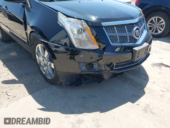 2011 Cadillac SRX Premium Collection z VIN 3GYFNCEY5BS597566, wystawiony jako IAAI lot #41983784 z przebiegiem 102 989 mil mil oraz . Historia ofert i sprzedaży dostępna na DreamBid. Obrazek 6.