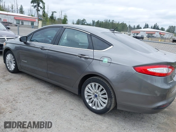 2014 Ford Fusion SE Hybrid with VIN 3FA6P0LU6ER285188, listed as a IAAI auction lot 42516215 with 122,899 mi miles and . Bid and sale history available at DreamBid. Image 3.