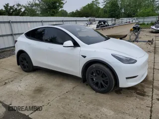 2024 Tesla Model Y Long Range with VIN 7SAYGDEE2RA329081, listed as a Copart auction lot 57254265 with 2,325 mi miles and Salvage title. Bid and sale history available at DreamBid. Image 4.