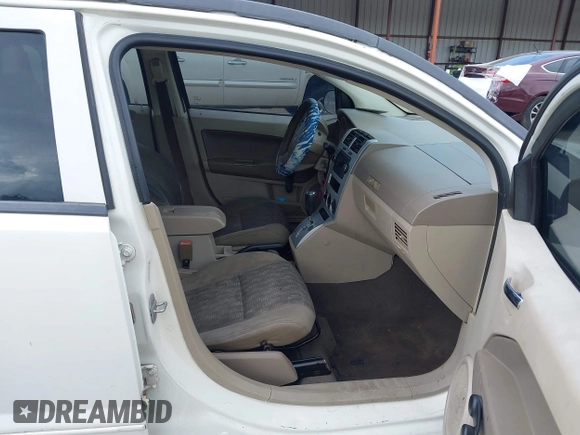2008 Dodge Caliber SE with VIN 1B3HB28B88D645452, listed as a IAAI auction lot 41965949 with 212,896 mi miles. Bid and sale history available at carsss.com. Image 5.