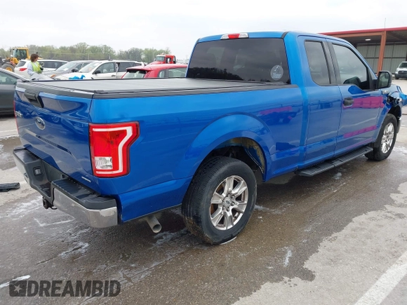 2015 Ford F-150 XL with VIN 1FTEX1C82FKD57797, listed as a IAAI auction lot 41986388 with 197,434 mi miles and . Bid and sale history available at DreamBid. Image 4.