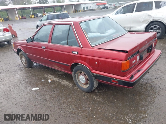 1990 Nissan Sentra z VIN JN1GB21B5LU503902, wystawiony jako IAAI lot #42358723 z przebiegiem 172 484 mil mil oraz . Historia ofert i sprzedaży dostępna na DreamBid. Obrazek 3.