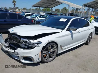 2020 BMW 5 Series M550i xDrive with VIN WBAJS7C0XLCD42738, listed as a IAAI auction lot 42326945 with 50,046 mi miles and . Bid and sale history available at DreamBid. Image 18.