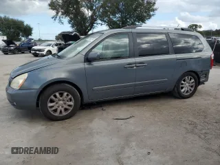 2009 Kia Sedona EX with VIN KNDMB233396299667, listed as a Copart auction lot 80186774 with 197,328 mi miles and Salvage Title. Bid and sale history available at carsss.com. Image 1.