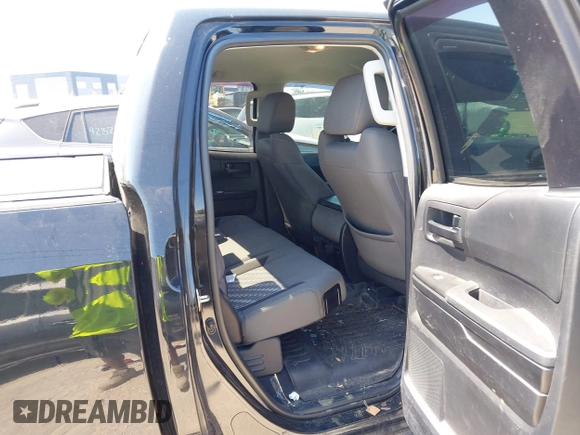 2019 Toyota Tundra SR with VIN 5TFUY5F13KX852912, listed as a IAAI auction lot 42327399 with 124,193 mi miles and . Bid and sale history available at DreamBid. Image 8.