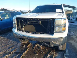 2014 Chevrolet Silverado 1500 LT with VIN 1GCVKREH4EZ148979, listed as a IAAI auction lot 41215714 with 193,710 mi miles and . Bid and sale history available at DreamBid. Image 6.