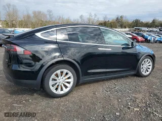 2018 Tesla Model X 75D with VIN 5YJXCAE29JF111980, listed as a Copart auction lot 51465695 with 0 mi miles and Salvage Title. Bid and sale history available at carsss.com. Image 3.