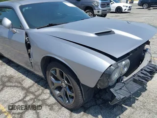 2015 Dodge Challenger SXT Plus z VIN 2C3CDZBG0FH715823, wystawiony jako IAAI lot #42354845 z przebiegiem 130 879 mil mil oraz . Historia ofert i sprzedaży dostępna na DreamBid. Obrazek 18.