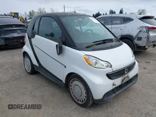 2014 Smart fortwo Pure with VIN WMEEJ3BA8EK747384, listed as a IAAI auction lot 41979651 with 29,586 mi miles and . Bid and sale history available at DreamBid. Image 1.