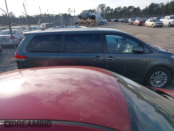 2012 Toyota Sienna XLE AAS with VIN 5TDYK3DC7CS276681, listed as a IAAI auction lot 41520303 with 183,511 mi miles and . Bid and sale history available at DreamBid. Image 13.