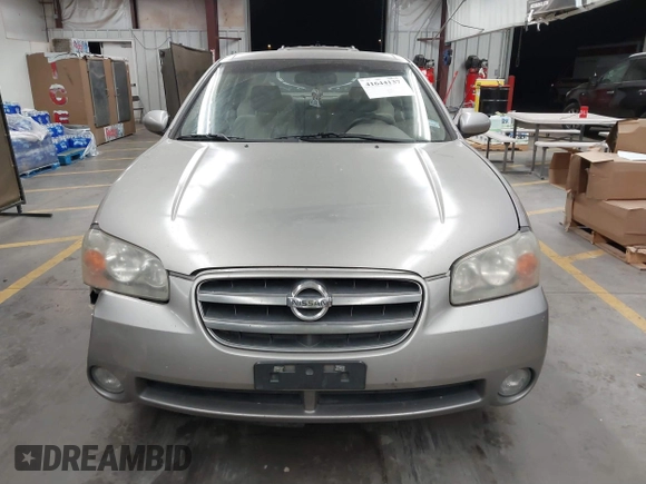 2002 Nissan Maxima GLE with VIN JN1DA31D32T422365, listed as a IAAI auction lot 41644137 with 165,157 mi miles and . Bid and sale history available at DreamBid. Image 12.