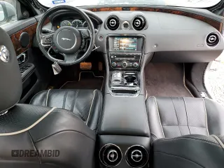 2015 Jaguar XJ with VIN SAJWA2GZ4F8V82350, listed as a Copart auction lot 83824414 with 47,767 mi miles and Salvage Title. Bid and sale history available at carsss.com. Image 8.