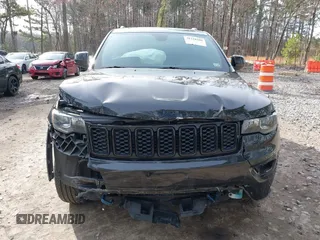 2018 Jeep Grand Cherokee Laredo E with VIN 1C4RJFAG1JC426542, listed as a IAAI auction lot 41729268 with 106,024 mi miles and . Bid and sale history available at DreamBid. Image 6.