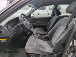 2003 Hyundai Sonata GLS with VIN KMHWF35HX3A866677, listed as a Copart auction lot 74620514 with 0 mi miles and Salvage Title. Bid and sale history available at carsss.com. Image 7.