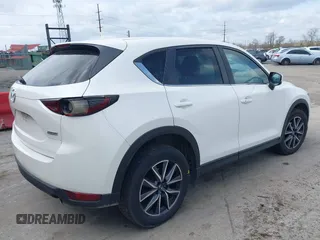 2018 Mazda CX-5 Touring with VIN JM3KFBCMXJ0353369, listed as a IAAI auction lot 41902554 with 154,104 mi miles and . Bid and sale history available at DreamBid. Image 4.