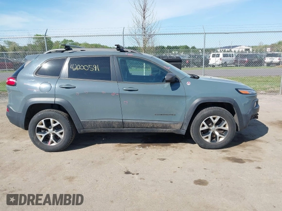 2015 Jeep Cherokee Trailhawk с VIN 1C4PJMBS2FW500538, выставлен на аукционе IAAI как лот 42000591 с пробегом 163 035 миль миль и . История ставок и продаж доступна на DreamBid. Изображение 13.