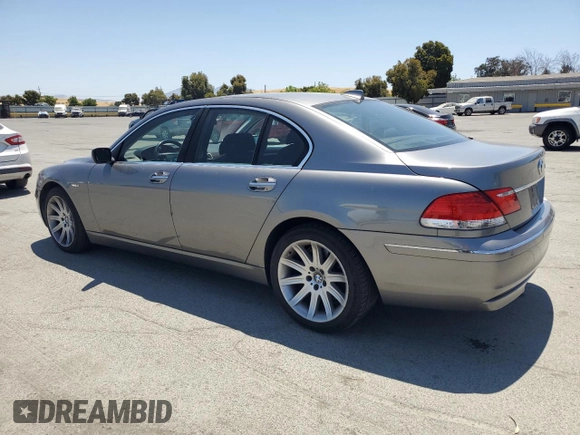 2006 BMW 7 Series 750i with VIN WBAHL83546DT02261, listed as a Copart auction lot 61686475 with 86,909 mi miles and Salvage title. Bid and sale history available at DreamBid. Image 2.