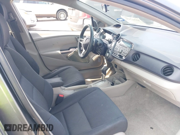 2010 Honda Insight EX with VIN JHMZE2H71AS043465, listed as a IAAI auction lot 42312556 with 151,009 mi miles and . Bid and sale history available at DreamBid. Image 5.