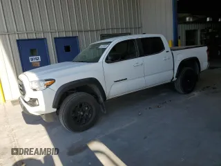 2023 Toyota Tacoma SR5 z VIN 3TMAZ5CN3PM219718, wystawiony jako Copart lot #55253845 z przebiegiem 18 879 mil mil oraz Szkody całkowita. Historia ofert i sprzedaży dostępna na DreamBid. Obrazek 1.
