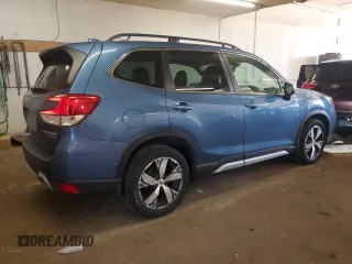 2021 Subaru Forester Touring z VIN JF2SKAXC9MH517699, wystawiony jako Copart lot #58962835 z przebiegiem 60 984 mil mil oraz Szkoda całkowita • Salvage title. Historia ofert i sprzedaży dostępna na DreamBid. Obrazek 3.