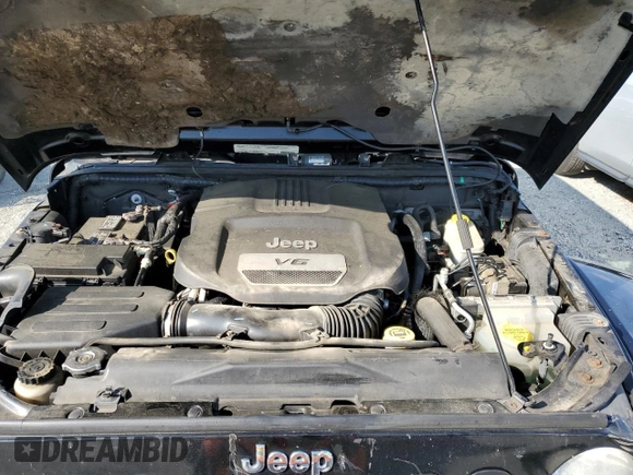 2012 Jeep Wrangler Sahara z VIN 1C4AJWBG6CL236704, wystawiony jako Copart lot #55099555 z przebiegiem 102 180 mil mil oraz Szkoda całkowita • Salvage title. Historia ofert i sprzedaży dostępna na DreamBid. Obrazek 11.