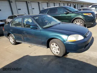 1998 Honda Civic EX with VIN 1HGEJ864XWL048125, listed as a Copart auction lot 73940844 with 146,271 mi miles and Salvage Title. Bid and sale history available at carsss.com. Image 4.
